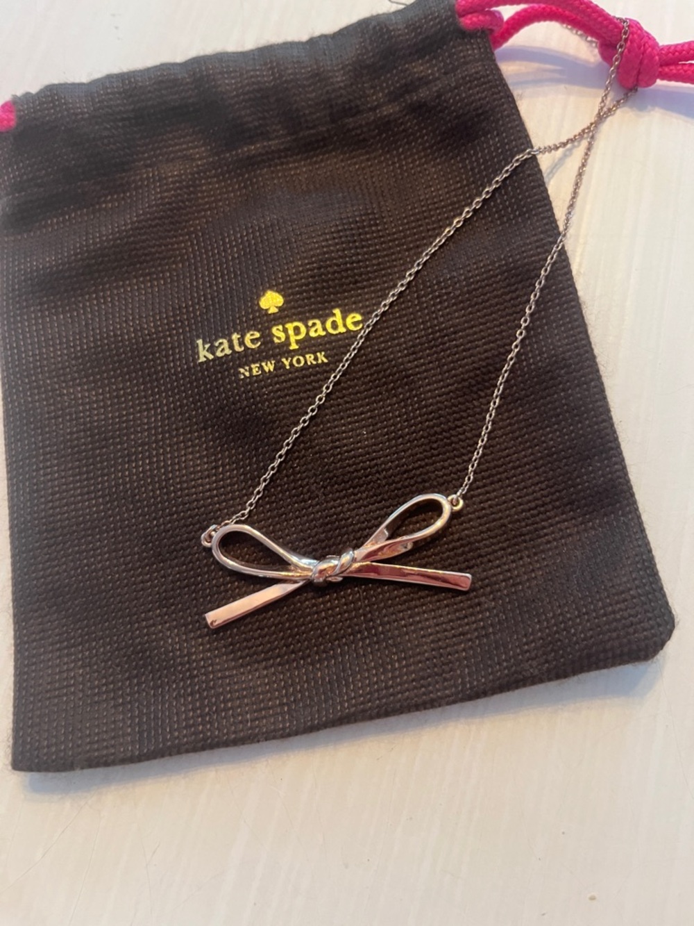 kate spade Rose Gold Bow Pendant Necklace with Branded Pouch - Picture 2 of 4